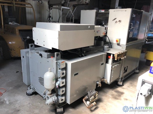 Used 90 Ton Toyo TT-90HR2 2-Station Rotary Vertical Injection Molding Machine 2 Used 90 Ton Toyo TT-90HR2 2-Station Rotary Vertical Injection Molding Machine