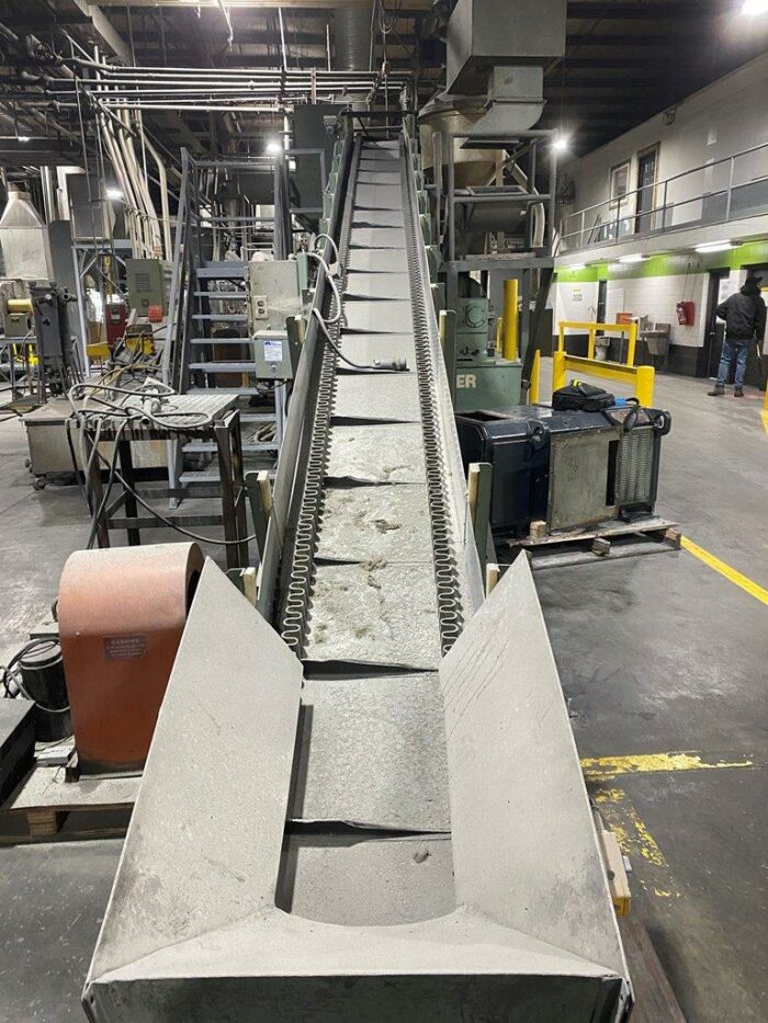 used 25’ cleated conveyor with eriez metal detection system
