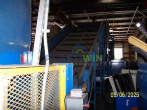 Used 200 HP SSI M100H(75) Dual-Shear Shredder with Conveyors